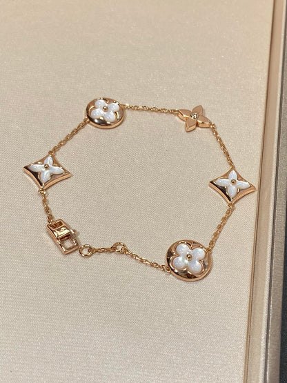 [Stellar Jewelry]STAR AND SUN 5 MOTIF MOP PINK GOLD BRACELET