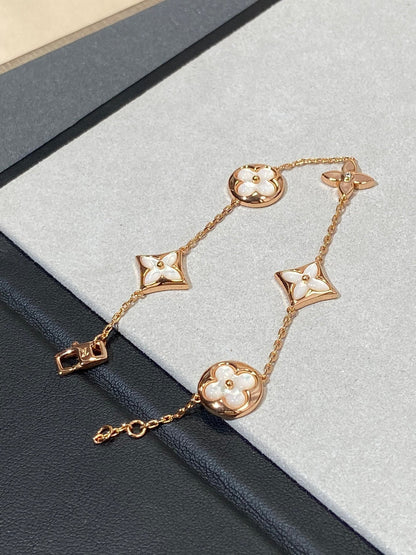 [Stellar Jewelry]STAR AND SUN 5 MOTIF MOP PINK GOLD BRACELET