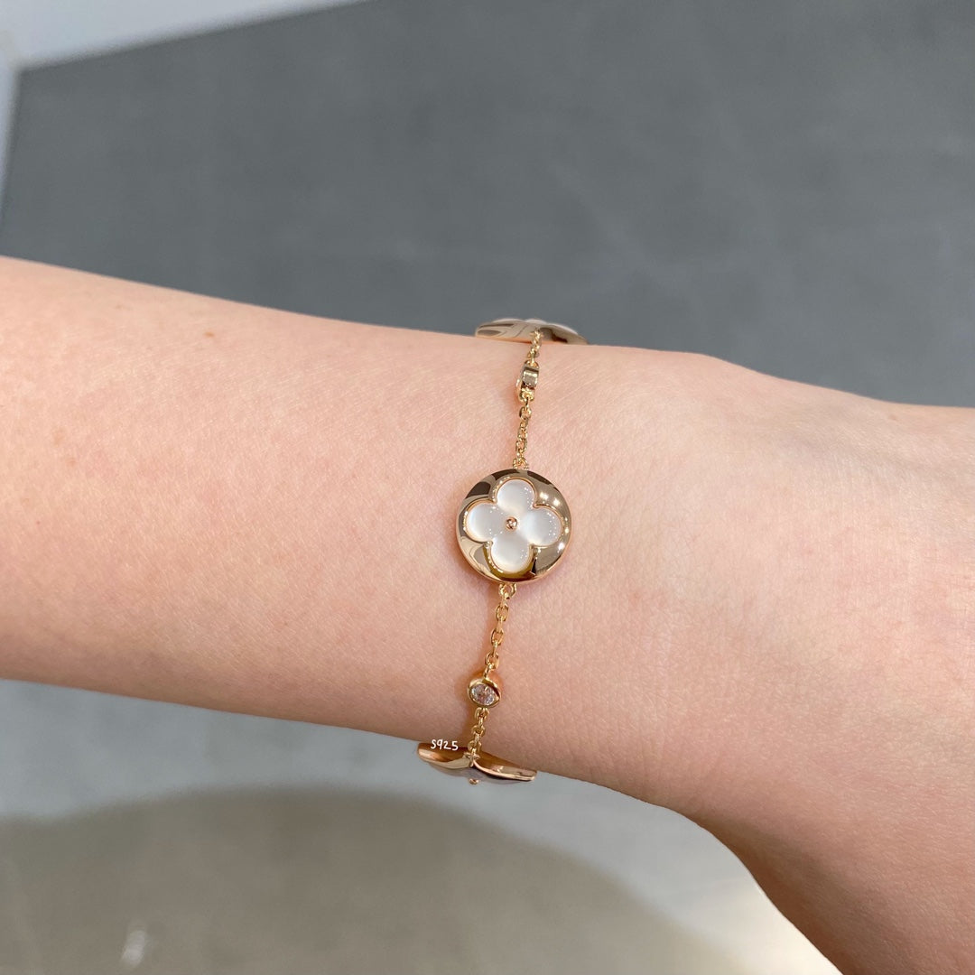 [Stellar Jewelry]STAR AND SUN 4 MOTIF WHITE MOP PINK GOLD BRACELET